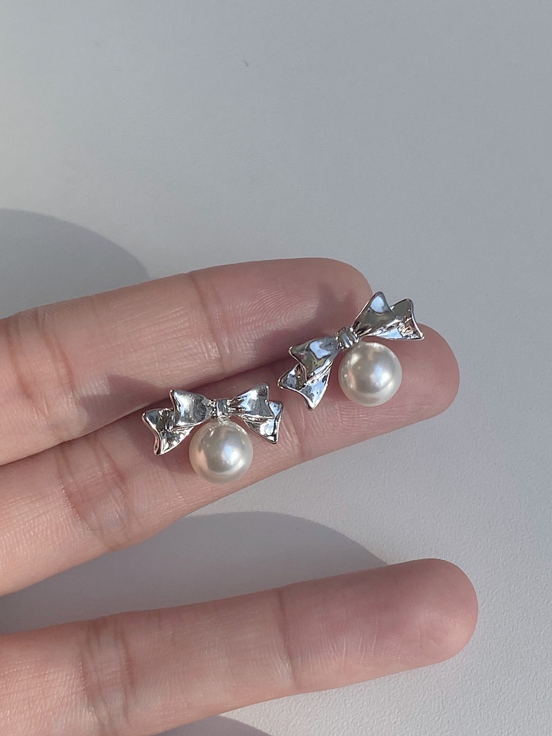 Ribbon pearl earring (MD PICK)